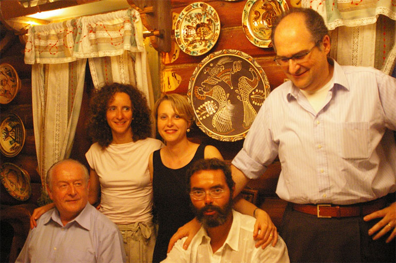 Group of Italian scientist in Kyїv restaurant. Left row right: Profs. Cesarani, Alpini, Rapponi. Their wives are at backside. They seems ti\o be satisfied